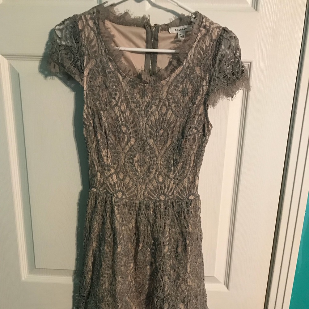 Beautiful lace open back dress.